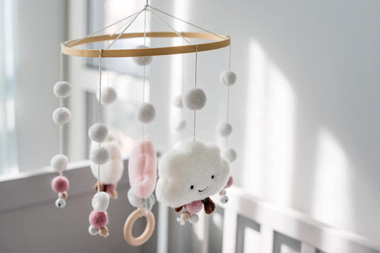 Creating a Calming Nursery Atmosphere with Mobiles: Tips for a serene environment.