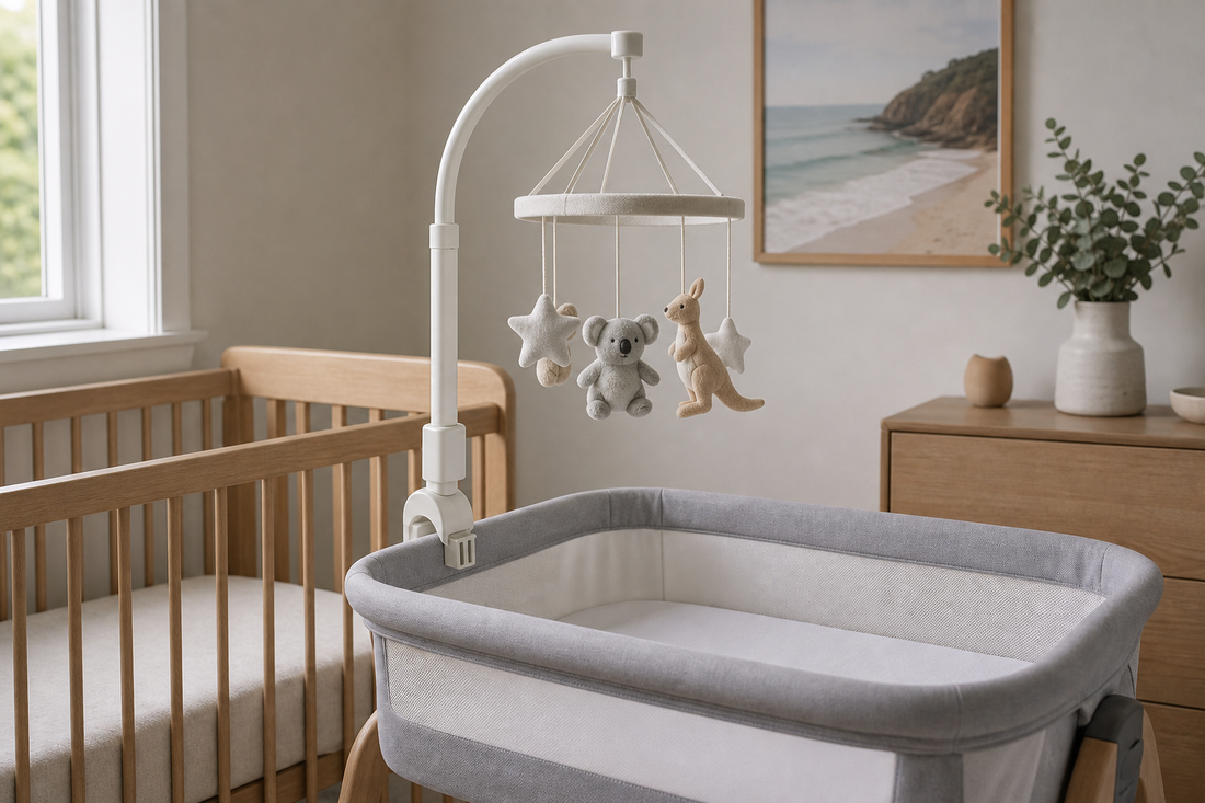 Modern Australian nursery with a secure mobile hanger near a clear bassinet