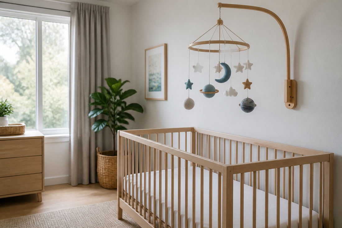 Modern Australian nursery with a cot mobile mounted safely above a clear timber cot